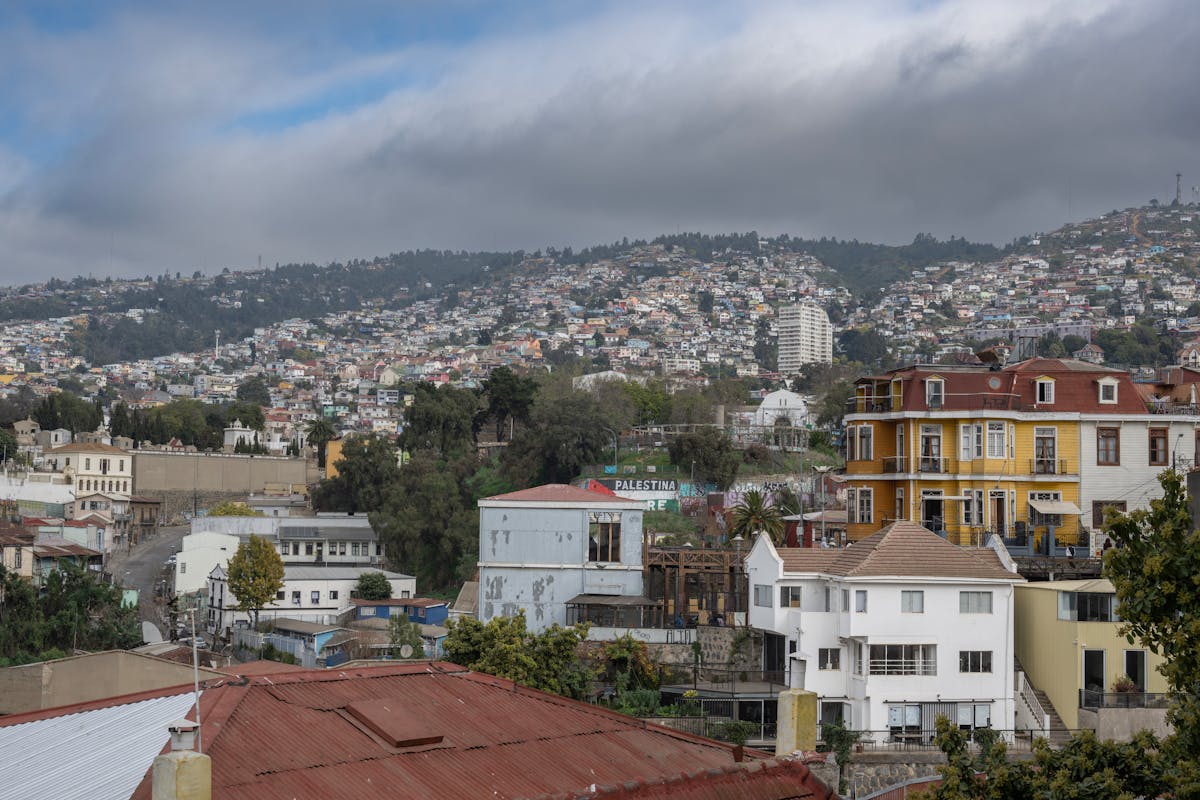 Colorful hillside buildings of Valparaiso Chile with narrow streets and colorful murals