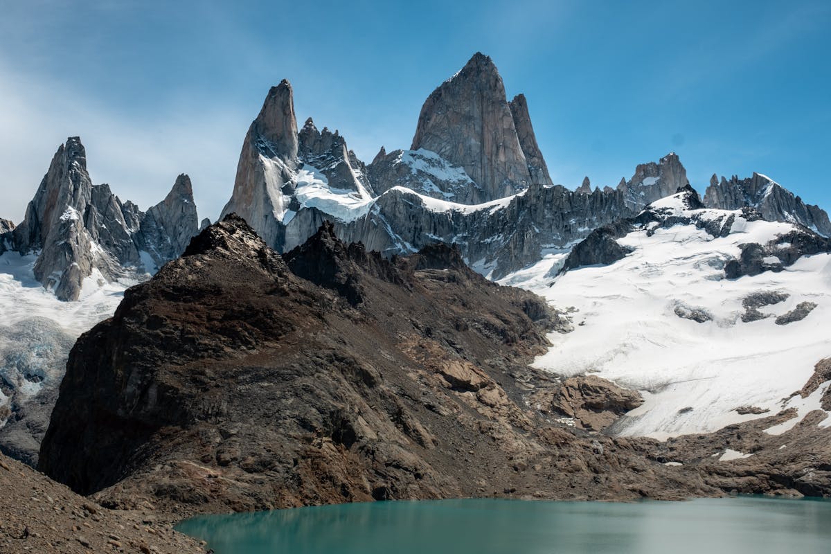 Mount Fitz Roy towering above a turquoise glacial lake in El Chalten, Argentine Patagonia