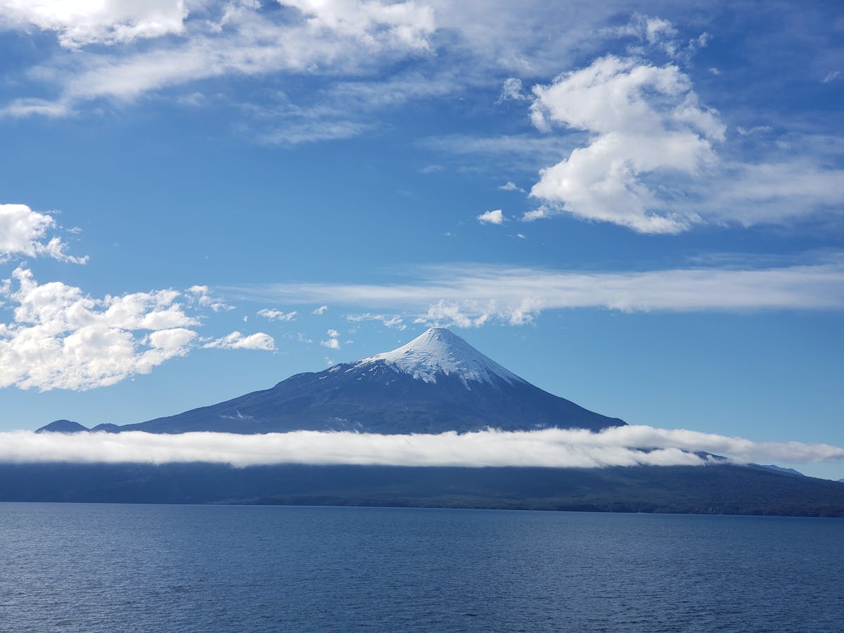 Osorno Volcano rising above a lake in Puerto Varas, Chile's Lake District