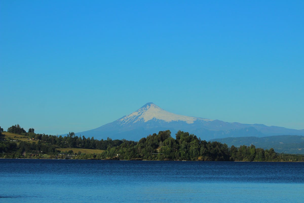 Villarrica Volcano reflected in a calm lake near Pucon, Chile