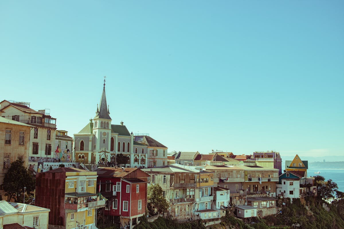 Colorful houses climbing the hillside in Valparaiso Chile with ocean in background