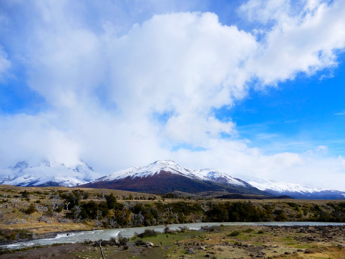 Snow-capped mountains and a river in Torres del Paine, Chile