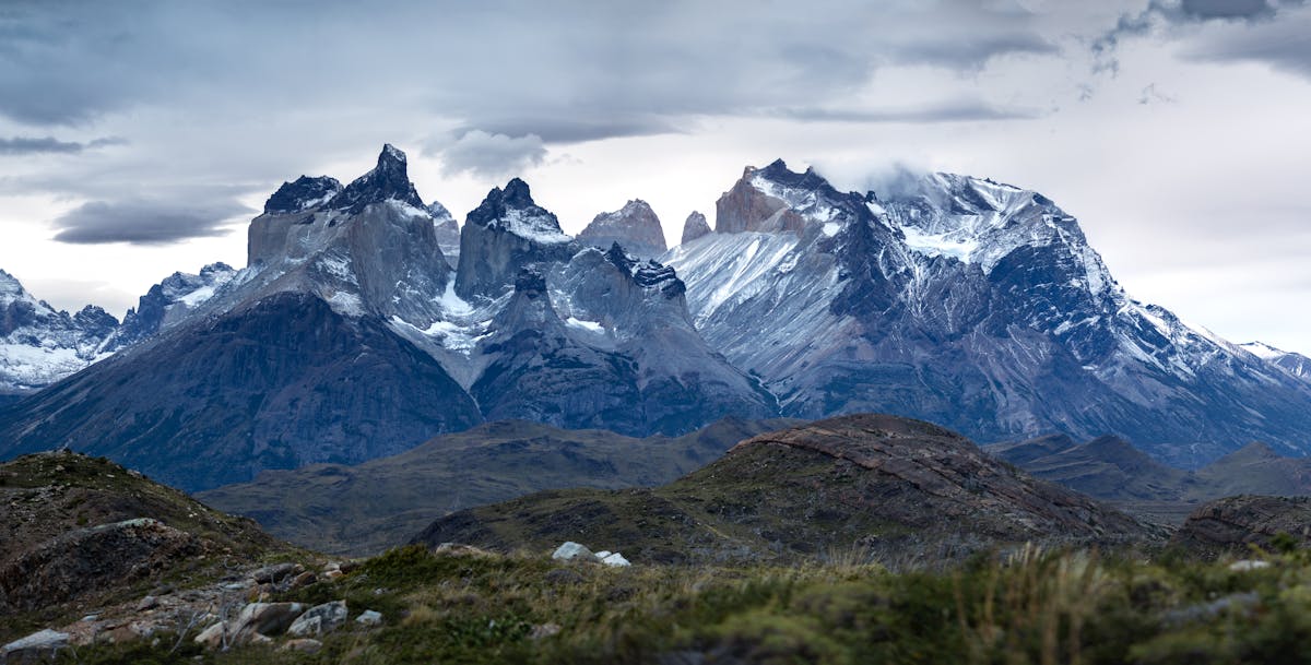 Torres del Paine mountain peaks with dramatic clouds in Chilean Patagonia