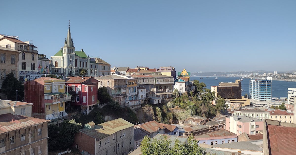 View of densely packed colorful houses on a steep hillside in Valparaiso
