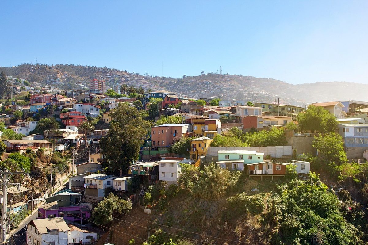 Historic funicular elevator climbing the cerro with colorful houses behind