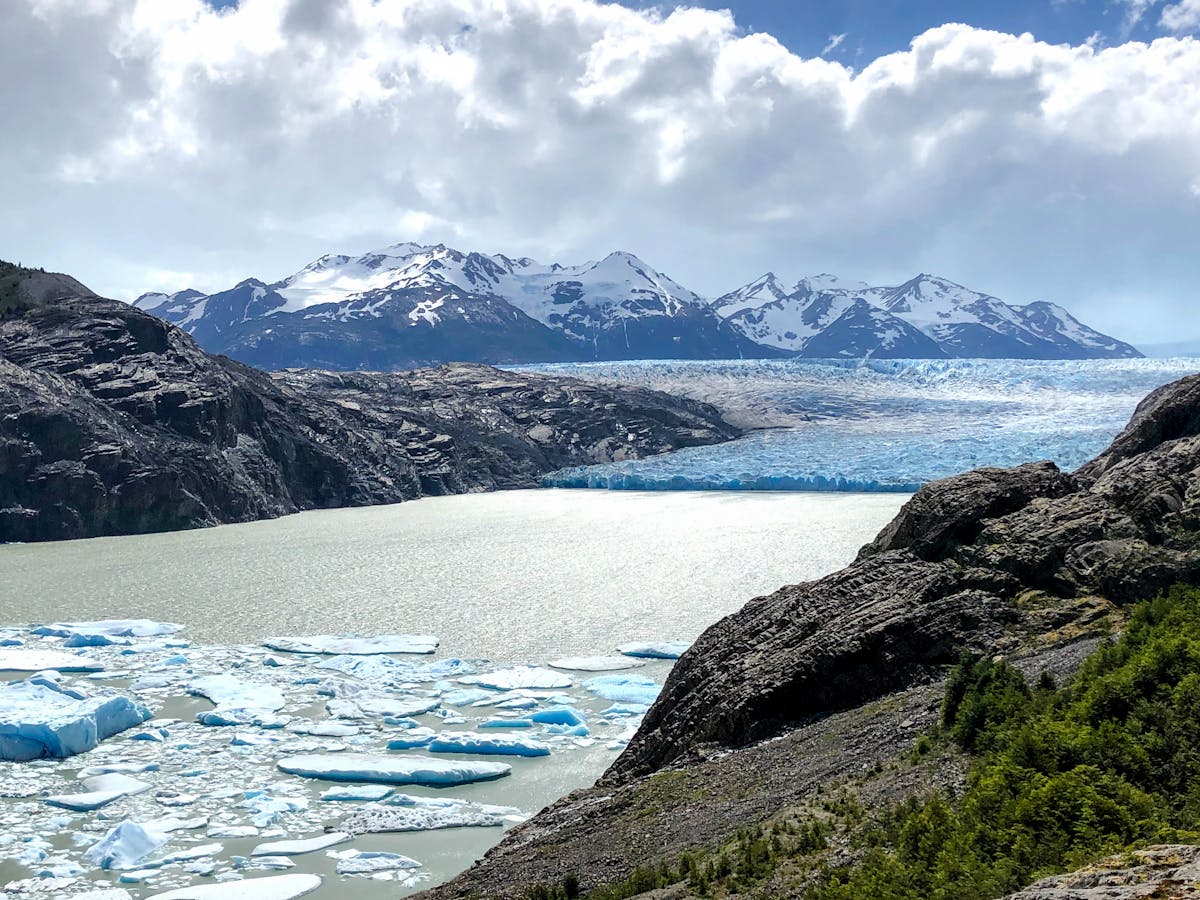 Glacier lake in Torres del Paine with mountains and icebergs