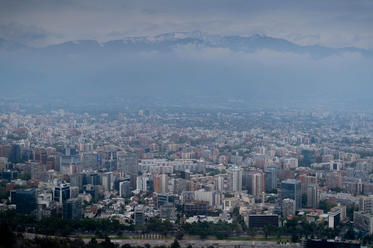 Stunning aerial view of Santiago, Chile's urban landscape with Andes backdrop.